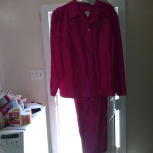 A pink Joan Leslie woman suit